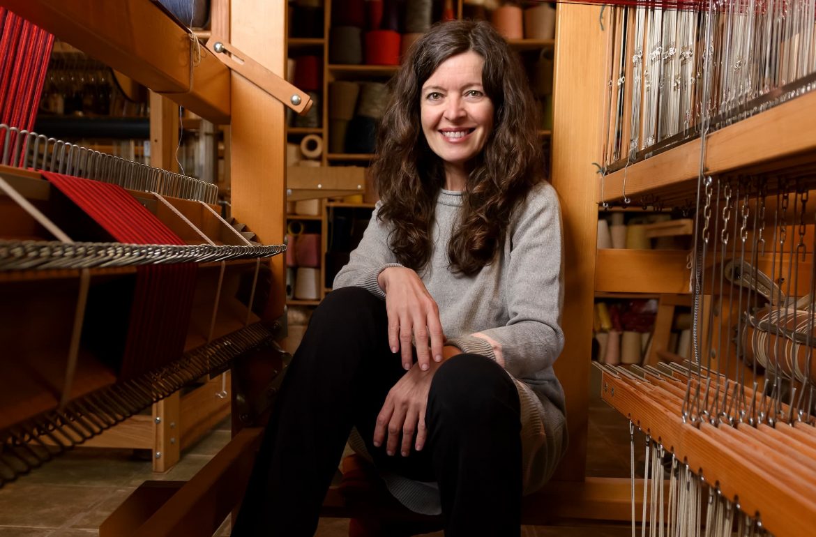 Ana Santiago weaving on a traditional hand loom at Ana y Francis Tejedores atelier in Sierra de Segura